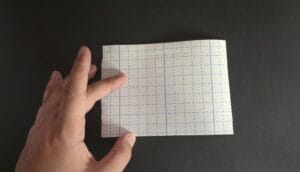 A cut out piece of fast-tape, ready to be folded into a t-tape