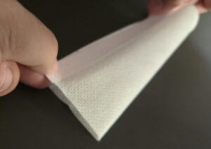 Folding up and lining up the top of the tabs
