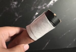 Topper put into t-tape, base first